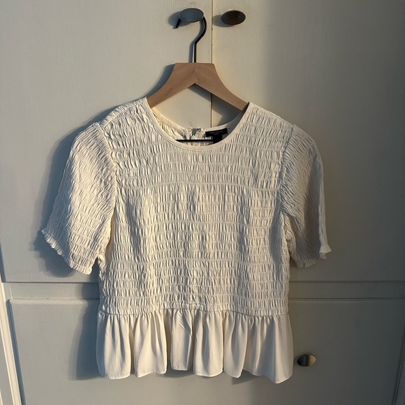 Ann Taylor Tops - Ann Taylor Cream Smocked Peplum Blouse